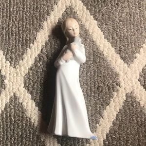 NAO handmade in Spain by Lladro “Girl holding puppy.”